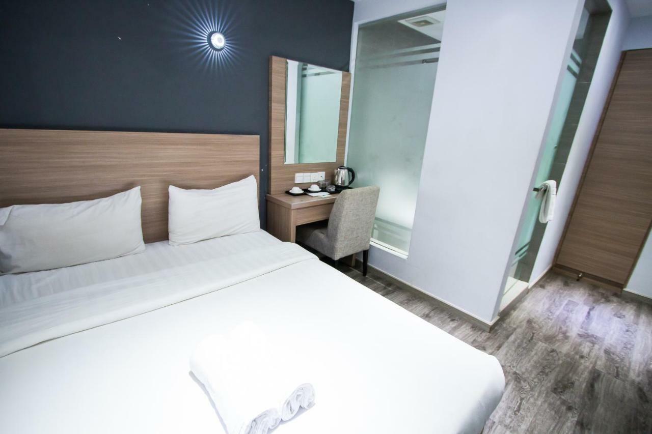 Hotel 99 Pusat Bandar Пучонг Экстерьер фото