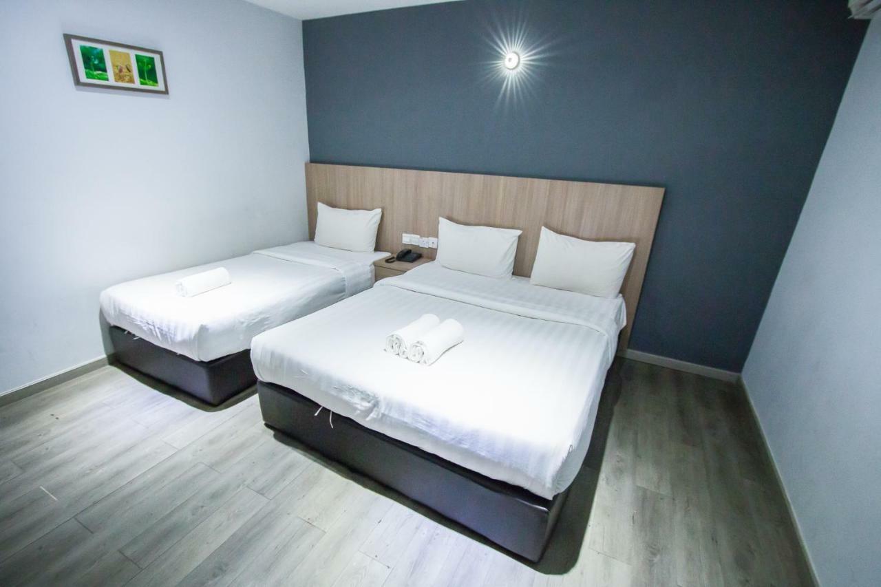 Hotel 99 Pusat Bandar Пучонг Экстерьер фото